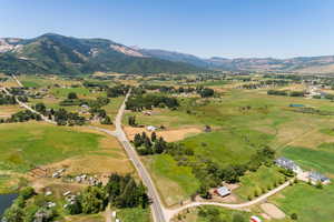 Aerial view with a mountain view and a rural view