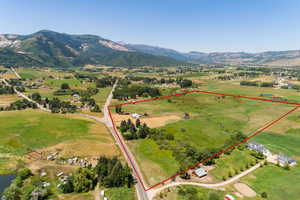 Aerial view with a mountain view and a rural view