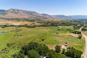 Drone / aerial view with a rural view and a mountain view