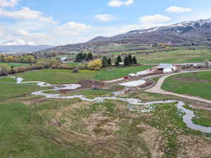 Property view of mountains with a rural view