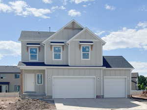 View of front facade with a garage