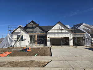 Property in mid-construction with a garage