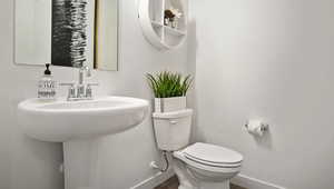 Bathroom with sink and toilet