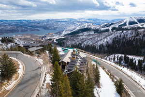 Snowy aerial view with a mountain view