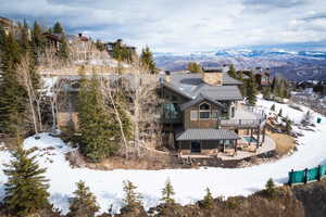 Snowy aerial view with a mountain view