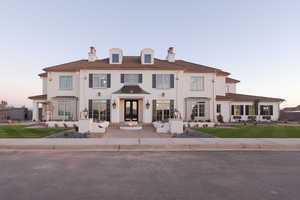 View of front of house with a lawn