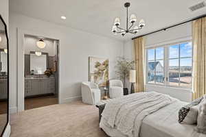 Carpeted bedroom with sink, a chandelier, and ensuite bath