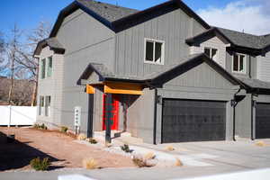 Modern farmhouse style home with a garage