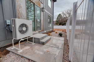 View of patio featuring ac unit