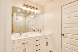 Bathroom featuring vanity and walk in shower