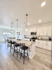 Open Kitchen with Granite Countertops and bar