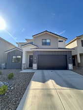 View of front facade with a garage