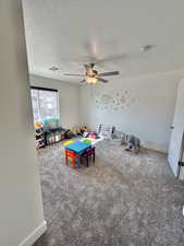 Bedroom with 'Jack-n-jill' bathroom, used as a play room.