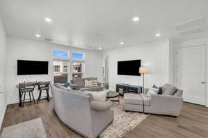 Living room featuring light hardwood / wood-style flooring