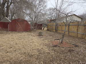 View of yard with a shed