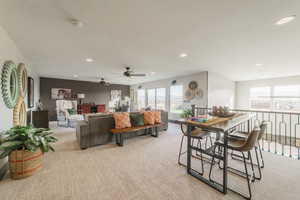 Carpeted living room featuring a textured ceiling