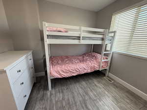 Bedroom featuring hardwood / wood-style flooring