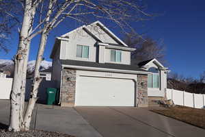 View of front of home with a garage