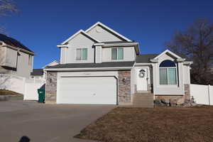 View of front facade with a garage