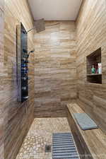 Bathroom featuring tiled shower