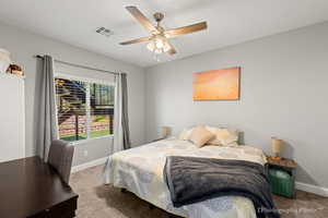 Bedroom with carpet floors and ceiling fan