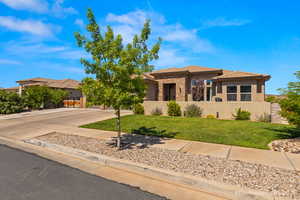 Prairie-style house with a front yard