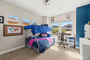 Bedroom featuring carpet