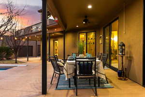 Patio terrace at dusk with ceiling fan