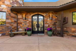 View of exterior entry featuring french doors