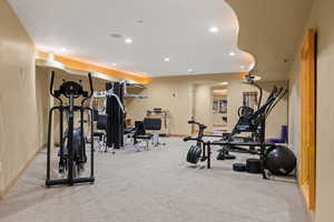 Workout room with recessed lighting, carpet floors, and baseboards