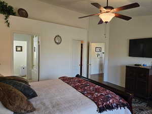 Bedroom featuring wood-type flooring and ceiling fan