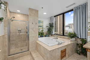 Primary Bathroom with independent shower and jetted bath