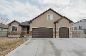 View of front of property with a garage