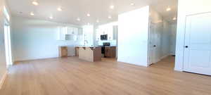 Open floor plan.  9' Ceilings.  Low Profile lighting.