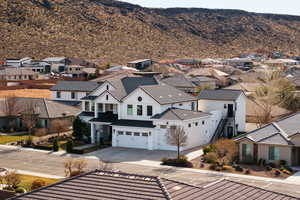 Birds eye view of property featuring a mountain view