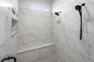 Bathroom with tiled shower