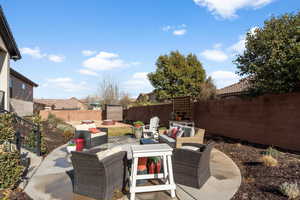 View of patio featuring an outdoor hangout area