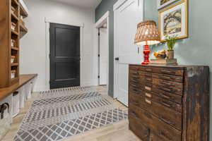 Mudroom featuring light hardwood / wood-style flooring