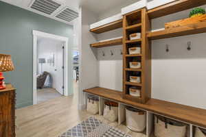 Mudroom featuring light wood-type flooring