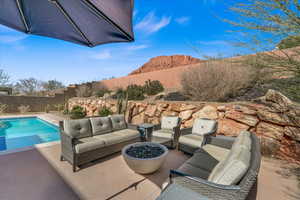 View of swimming pool with an outdoor hangout area and a patio