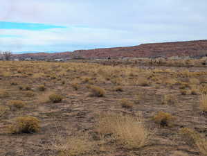 Property view of mountains with a rural view