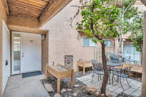 Entrance to property with a patio