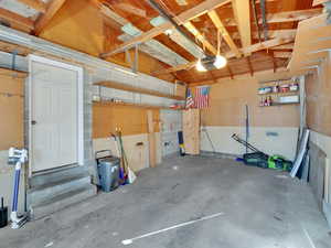 Garage featuring a garage door opener