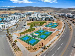 Birds eye view of property with a mountain view