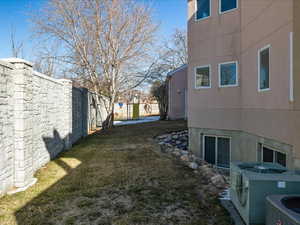 View of yard featuring central air condition unit