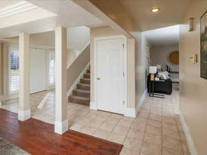 Hall with light tile patterned floors