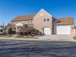 View of front of home with a garage