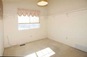 View of carpeted spare room