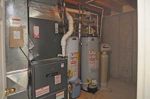 Utilities featuring heating unit and gas water heater