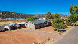 Drone / aerial view featuring a mountain view